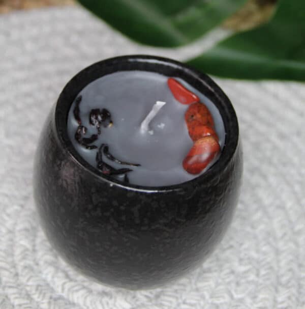 Grey Ylang Ylang and flora fragranced & red jasper stones in a Beautiful black jar